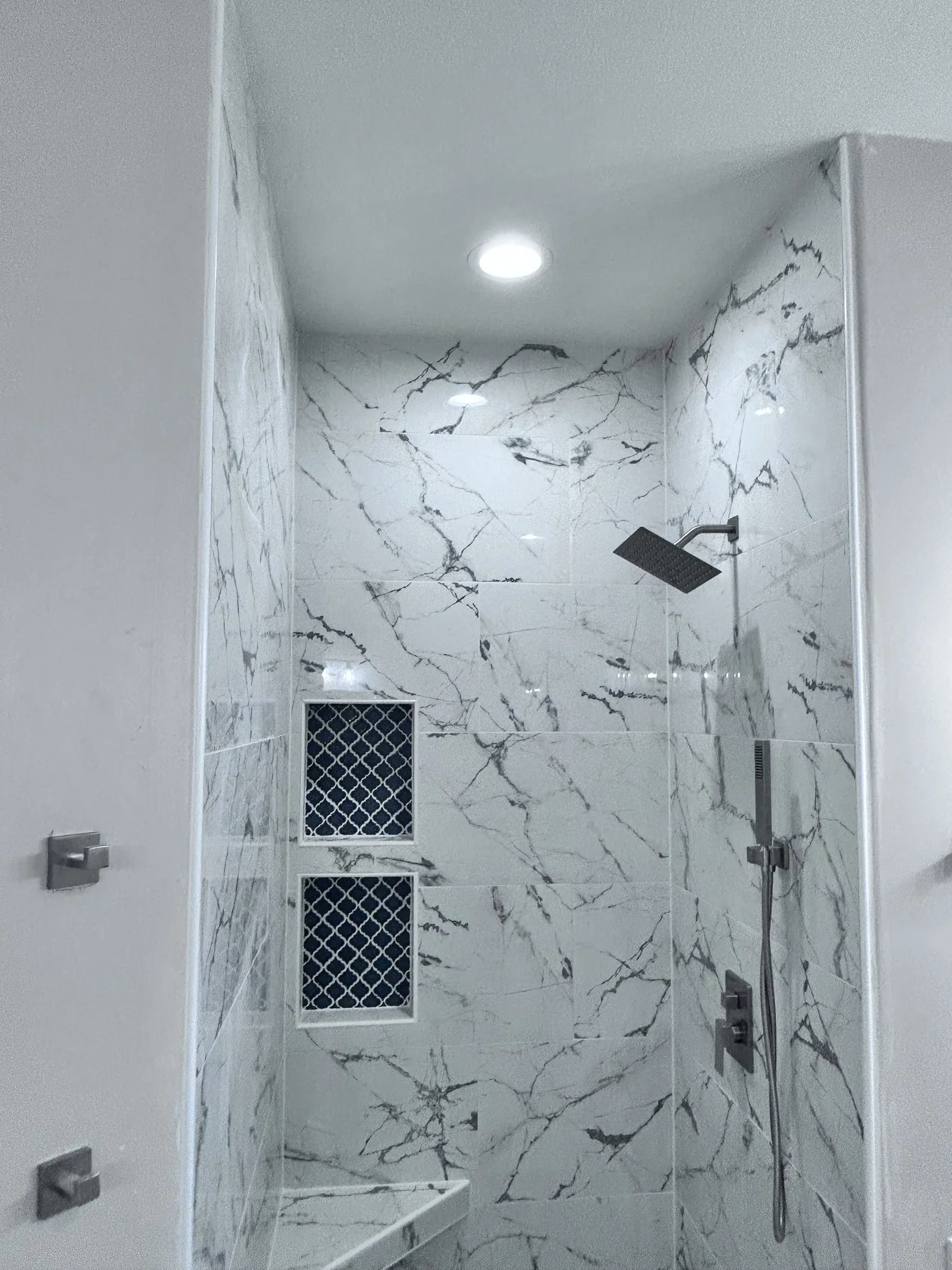 Custom tile shower installation by Selena Albarran